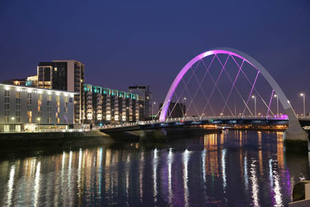 The Clyde Arc is lit up at night